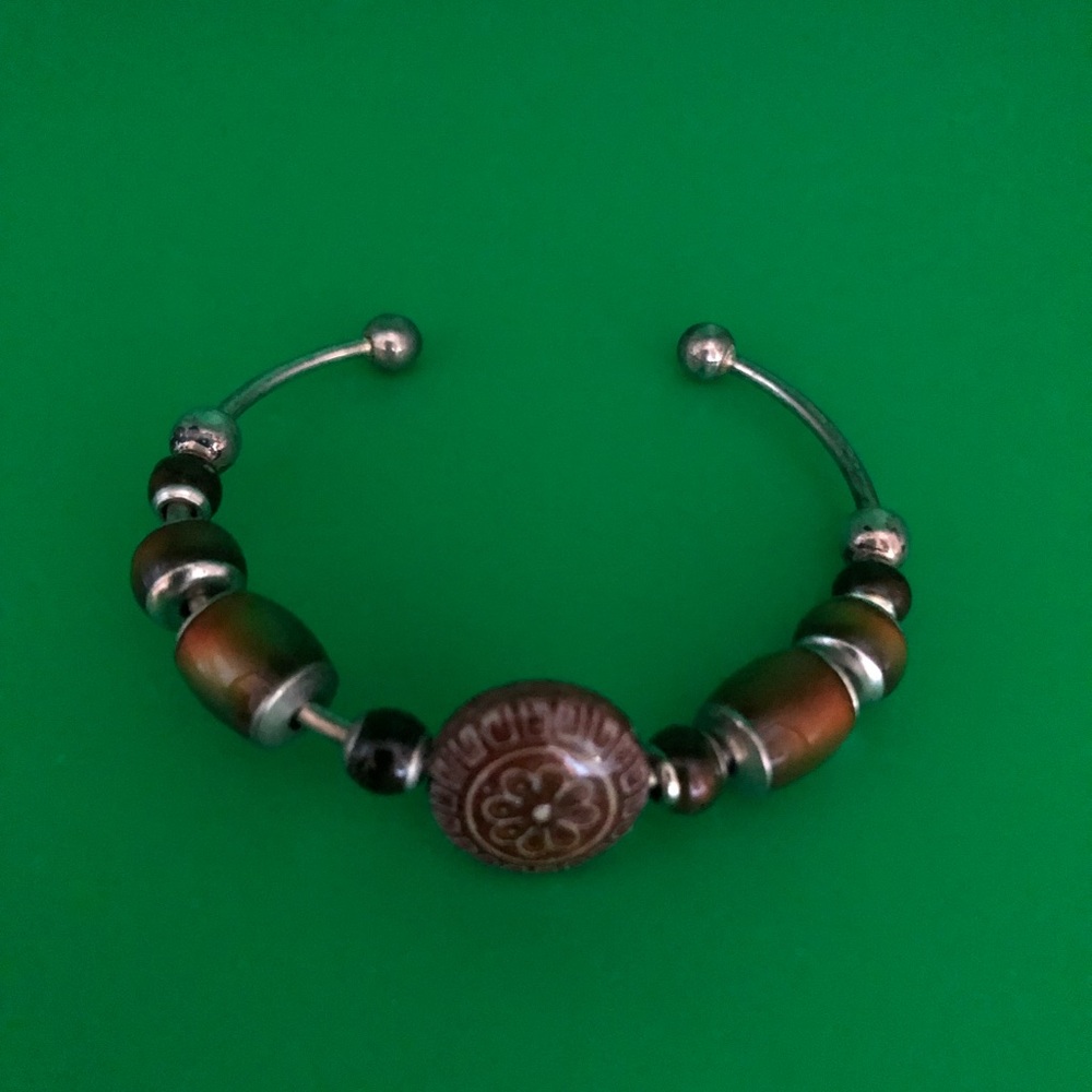 Silver tone cuff bracelet with mood beads